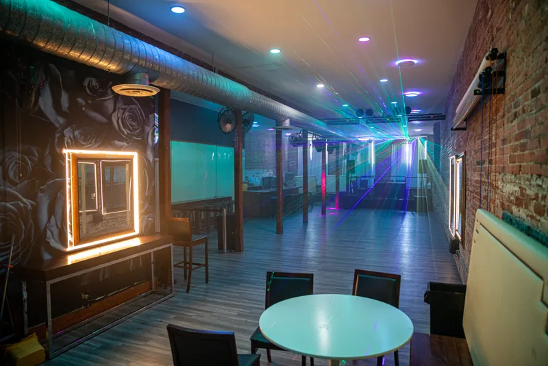 The upstairs room set with a table for a private party